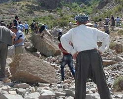 Köylüler çatışma bölgesinden 14 ceset topladı