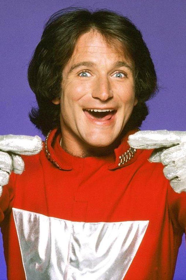 23. In 1977, Robin Williams was 26 in his first movie performace. Before his death, he last performed in "Boulevard." He was 63 when he lost his life.