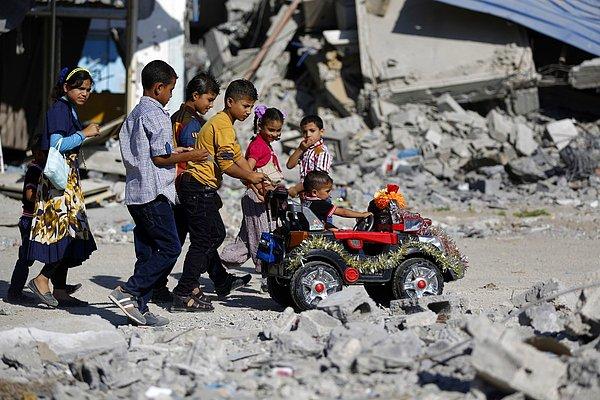 13. Kurban Bayramında Gazze'nin kuzey bölgesinde olan Beyt Hanun'da oynayan çocuklar, 4 Ekim 2014.