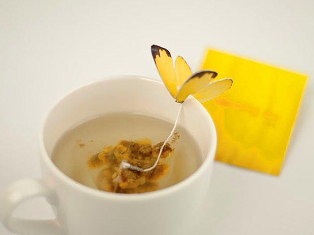 21. Bardağınıza kelebek konduran diğer bir poşet çay ambalajı.