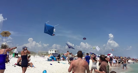 Alçak Uçuş Yaparak Plajdaki Şemsiyeleri Özgürlüğüne Kavuşturan Pilot