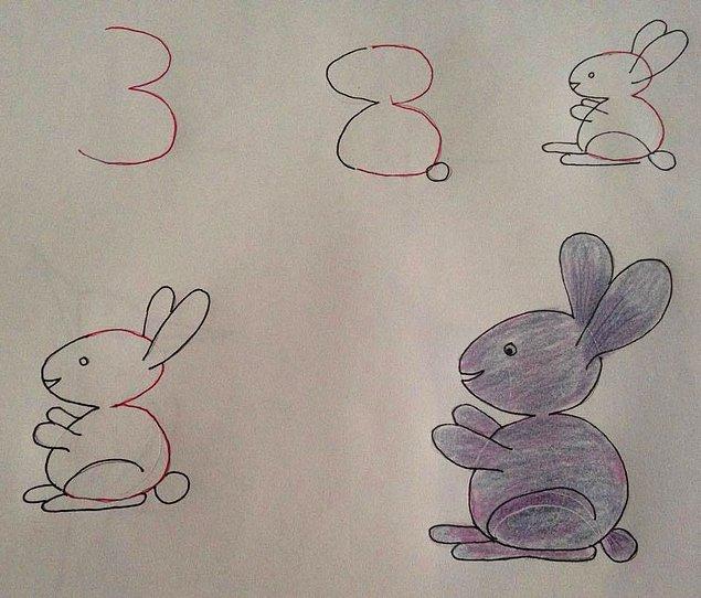 A standing and smiling rabbit with 3