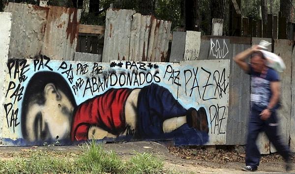 14. Brezilya'da yine Aylan'ın ölümüne tepki olarak çizilmiş bir graffiti