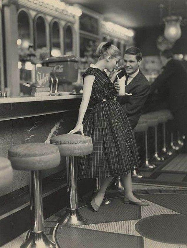 10. A young couple flirting, 1950's