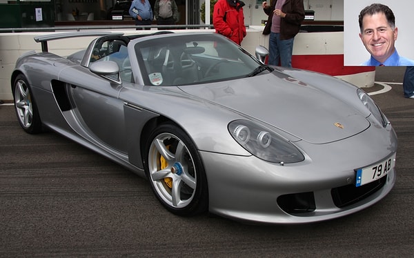 6. Основатель и руководитель компании Dell Майкл Делл и его Porsche Carrera GT (помимо любимого Hummer H2).