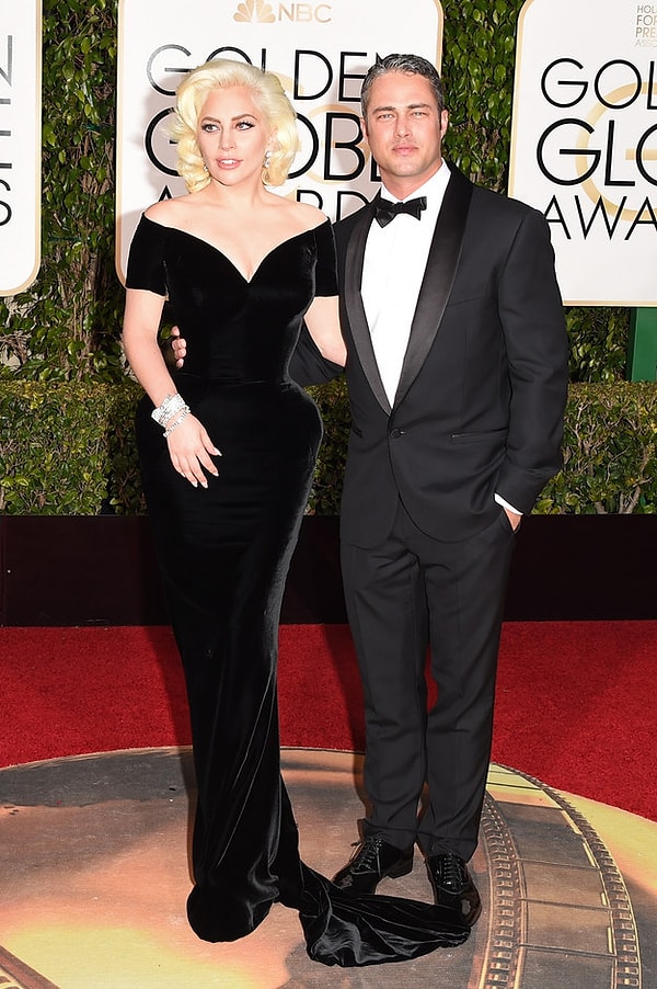 Леди Гага и Тейлор Кинни.