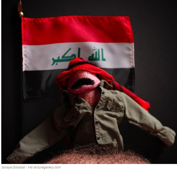 Саддам Хусейн.