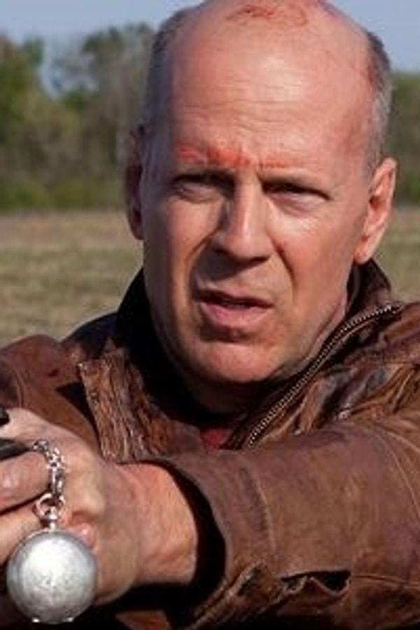 22. Looper filminde Bruce Willis ve karşı karşıya geldiği gençliği rolünde Joseph Gordon-Levitt.