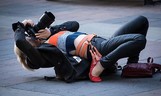 2. Are you trying to dodge a bullet in the Matrix or are you just taking a photo?