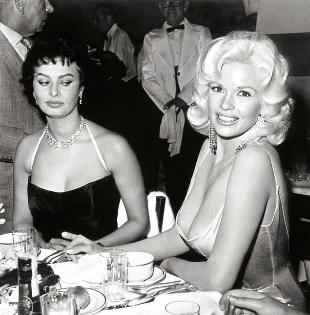 5. Jealousy: Sophie Loren can't take her eyes off Jayne Mansfield during a party thrown for her on 12th April, 1957.