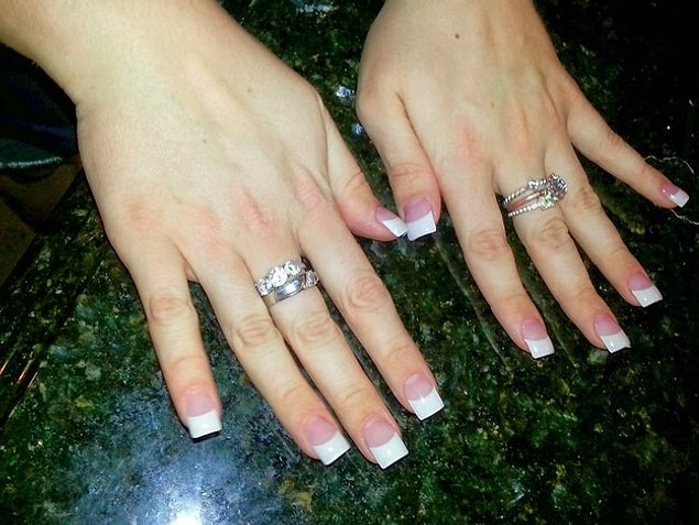 17. Doing French manicure on long square nails.