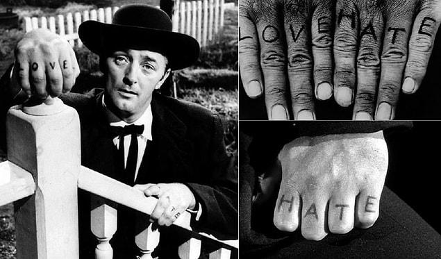 15. The "Night of the Hunter's" unforgettable love and hate knuckle tattoos.