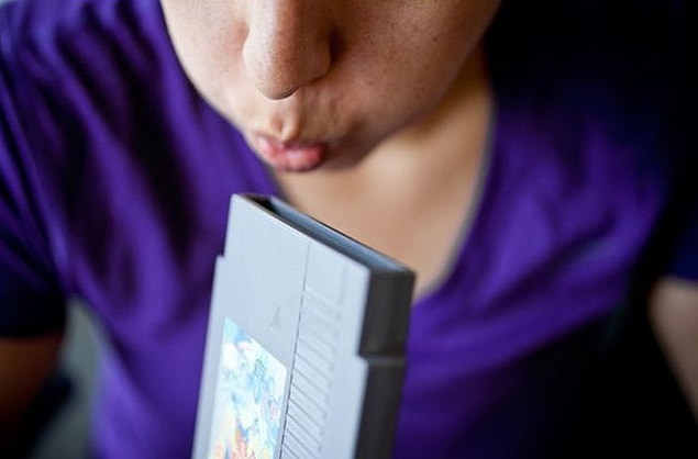 5. Blowing inside the Atari cassettes so that they work properly.