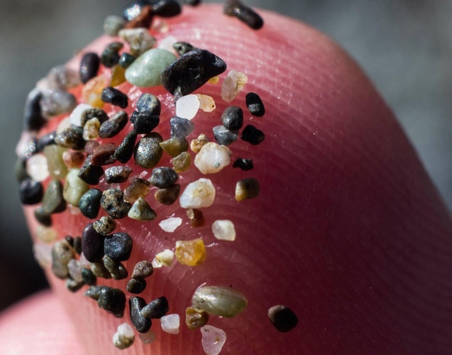 10. Sand grains on a finger