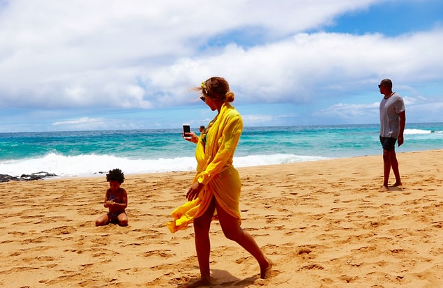 14. The combination of her colorful swim suit with the yellow kimono is simply perfect!
