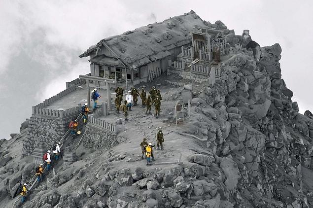 15. A temple covered in ash from the Ontake volcanic eruption, Japan