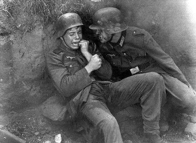 1. A German soldier with the horror of war on his face.
