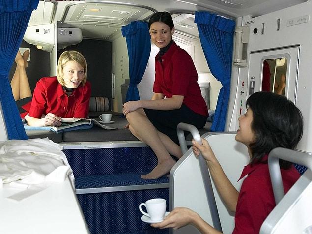 And this is how these rest areas look in a Boeing 777. It seems fun to be in. Each has a personal storage space for the crew members.