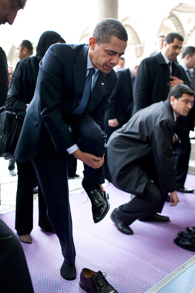 13. While he was taking his shoes off before going into the Blue Mosque in Istanbul.
