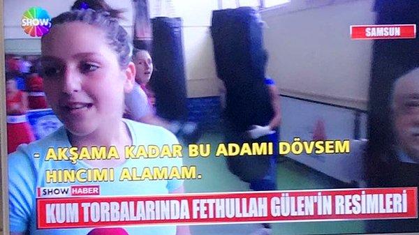3. Kum torbalarına yapıştırdıkları Fethullah Gülen'in fotoğrafına yumruk atarak boks antrenmanı yapan sporcular.