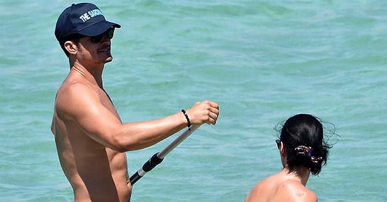 Орландо Блум прокатился на серфе в обнаженном виде и стал героем фотожаб