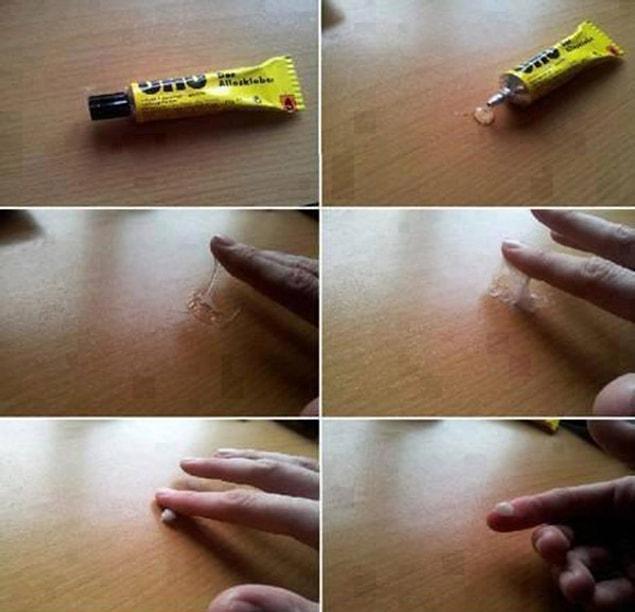 2. Sticking our fingers together with glue.