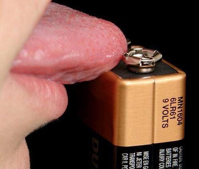5. Licking a battery.
