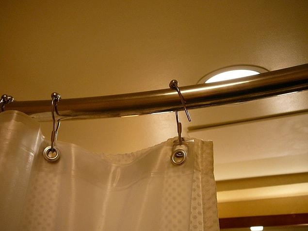 4. A curyed shower curtain will make your space seem bigger.