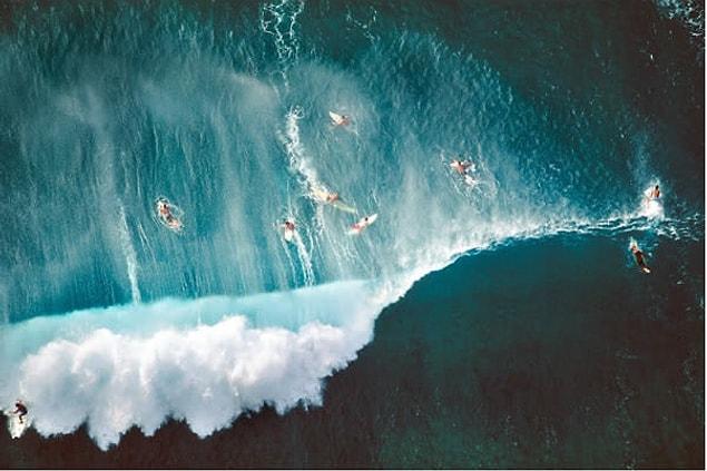 6. People surfing at beach on Oahu, Hawaii