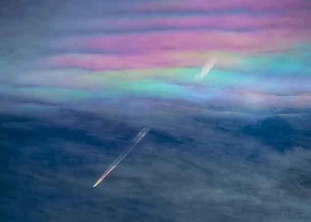 3. An airplane flying inside a rainbow