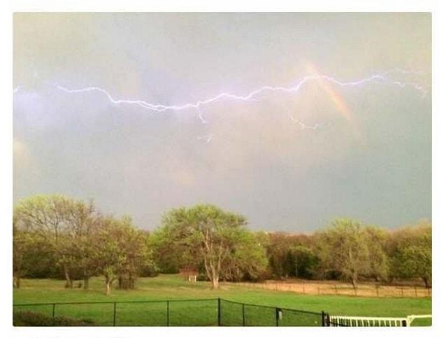 15. Lightning and rainbow on a single photo