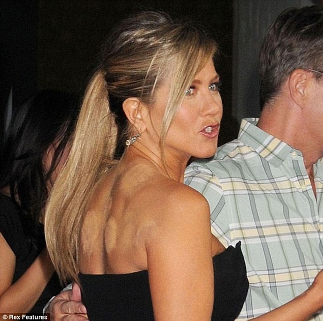 12. Jennifer made some circles with her concealer on her back to make her dress more dynamic! On second thought, maybe not!