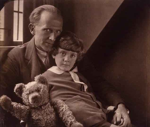 15. Alan Milne with the ’original’ Christopher Robin and Winnie the Pooh.