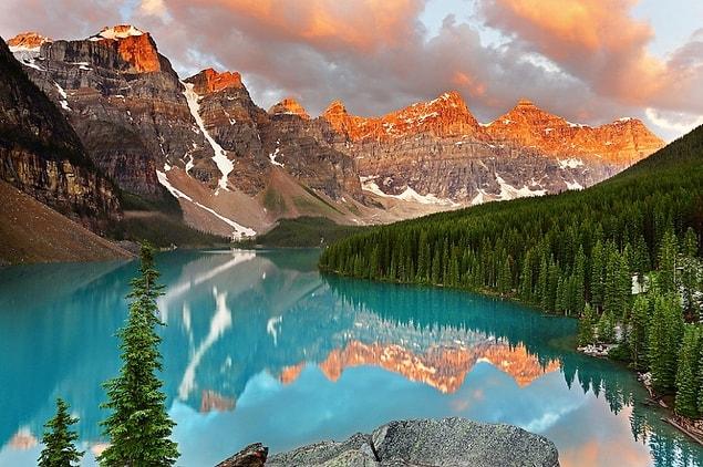 4. Look into the crystal-clear glacial Moraine Lake in the mountains of Canada