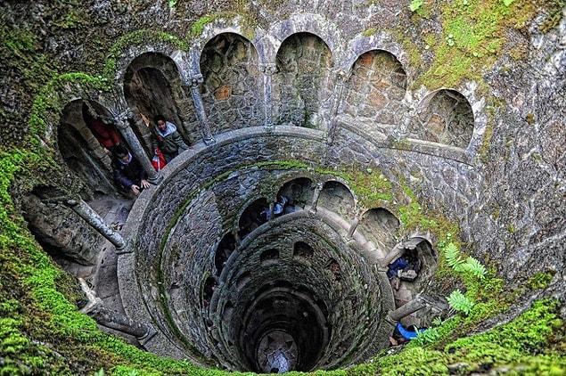 28. Descend into a mysterious well, symbolizing the 9 circles of hell, in the gothic Quinta da Regaleira