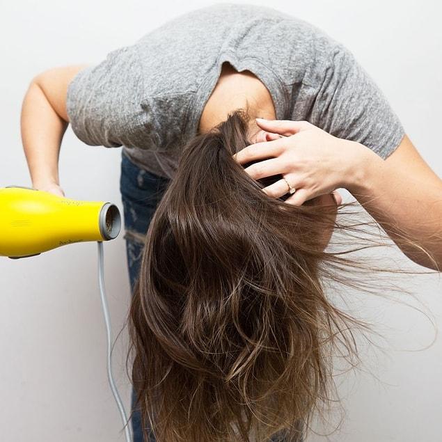11. While blow drying your hair, don't forget to tilt your head forward and blow dry it from that angle before finishing it.