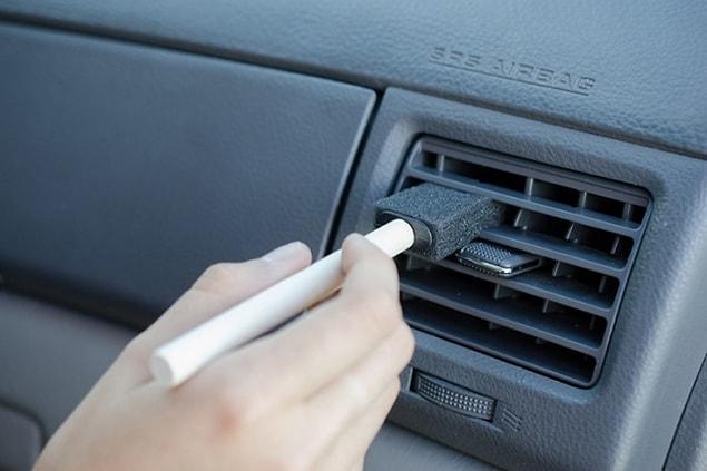 12. A paintbrush works really well for cleaning the dust out of hard-to-reach areas in your car.