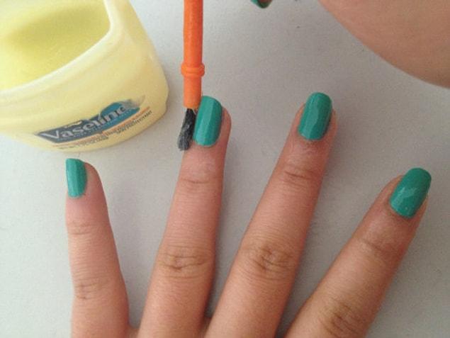 9. Apply a small amount of vaseline around your nails to easily remove unwanted polish around your cuticles.