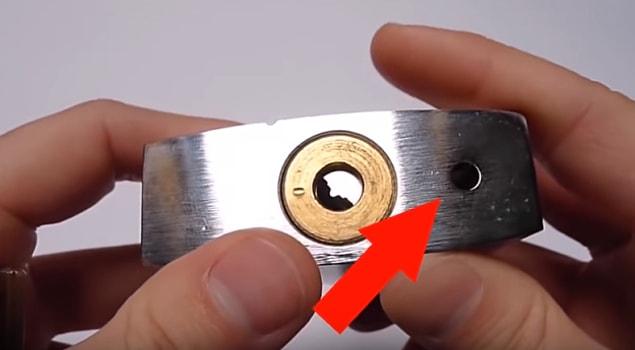 13. Ever notice a little hole in the bottom of a padlock?