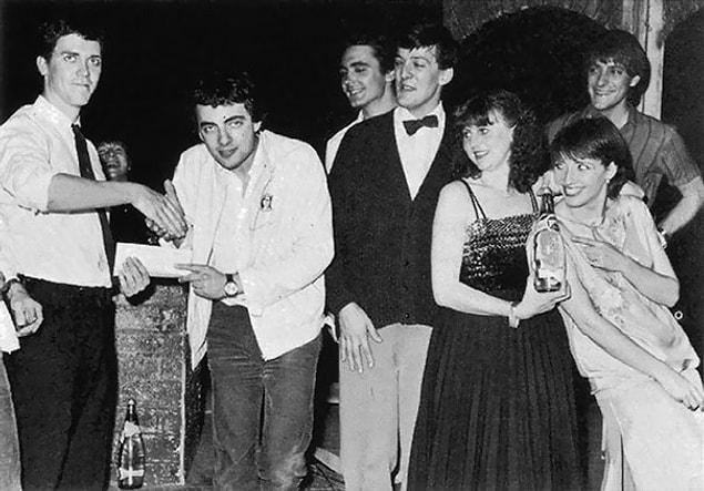 12. Young Hugh Laurie, Rowan Atkinson, Tony Slattery, Stephen Fry, Penny Dwyer, Emma Thompson and Paul Shearer winning the first Perrier Comedy Awards, 1981