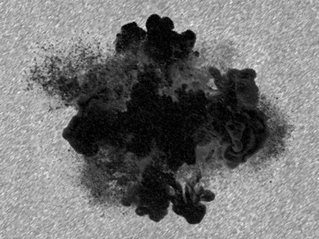 7. A little darkness, what do you see in this inkblot?