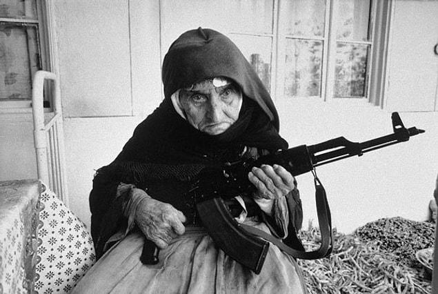 18. 106-year-old Armenian Woman Guards Home, 1990
