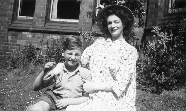 8. 9-year-old John Lennon with his mother, 1949.