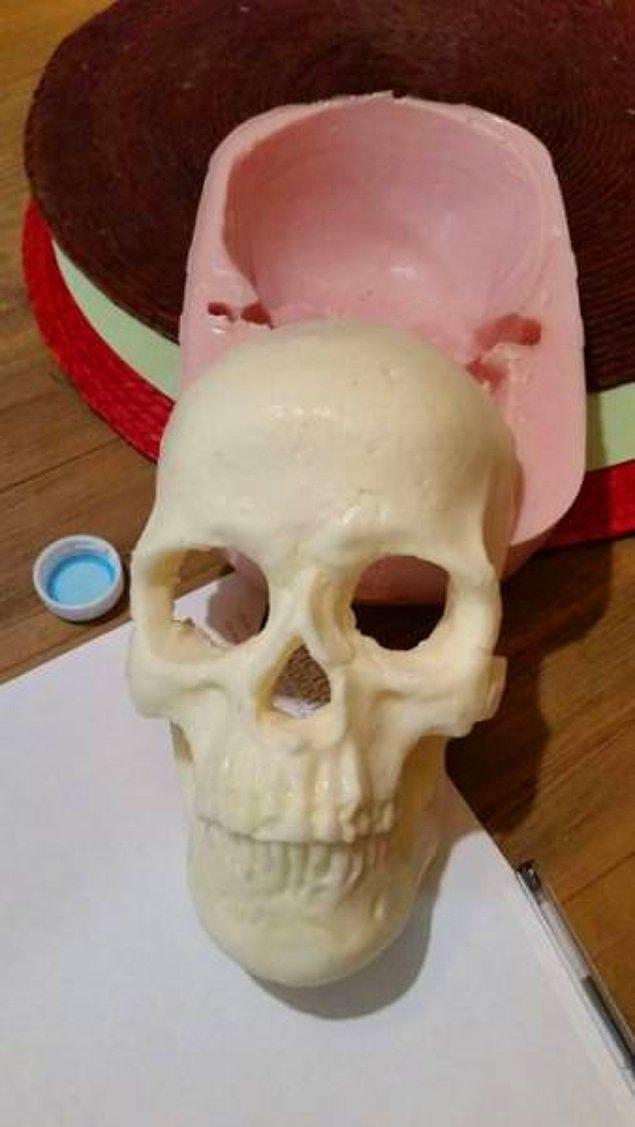 Then she makes a skull mold with another silicon mold.