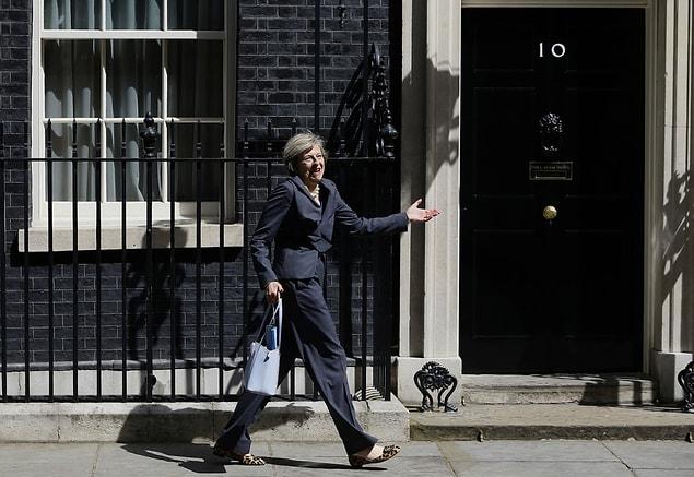 20. Following David Cameron's final cabinet meeting, then-incoming Prime Minister Theresa May shared a laugh with photographers as she walked the wrong way out of 10 Downing Street.