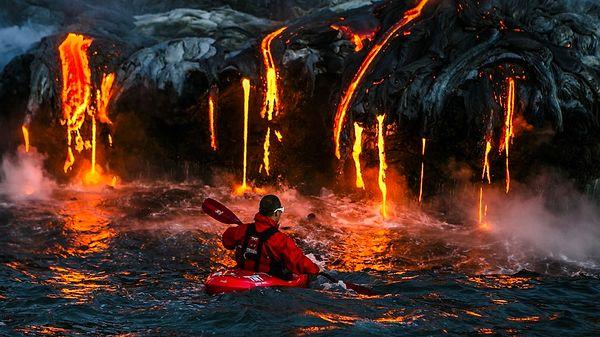 9. Extreme kayaking near molten lava in Hawaii.