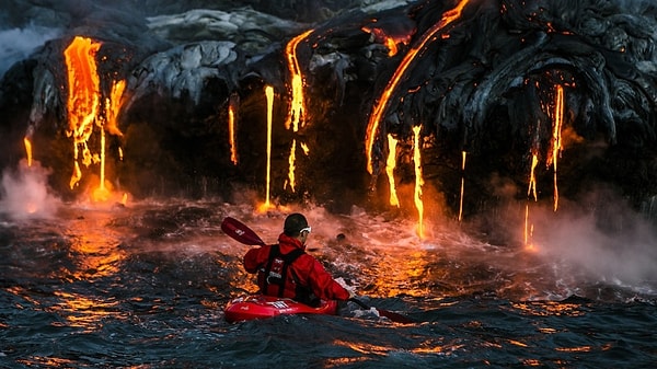 9. Extreme kayaking near molten lava in Hawaii.