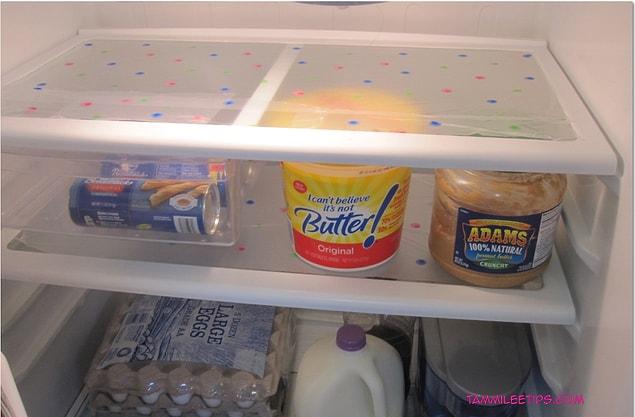 10. Cover your fridge shelves with stretch wrap to keep them clean.