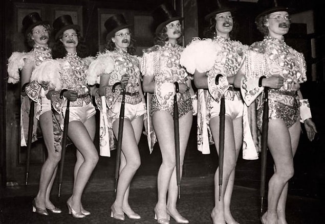 19. Cabaret Dancers wearing fake mustaches