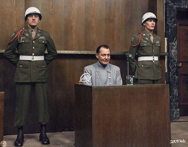 17. Hermann Göring sits in the dock at the Nuremberg Trial, 1946.